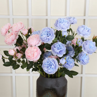 acheter Le salon de l'hôtel est décoré de fleurs avec des pivoines artificielles. fabrication en ligne