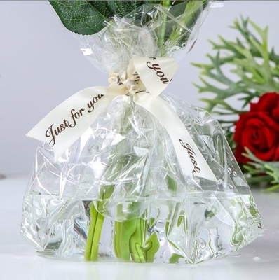 acheter Papeterie d'emballage de bouquet de fleurs imperméable à l'eau 70 feuilles de cellophane entièrement transparent fournitures de boutique de fleurs 52*52cm Beaucoup de couleurs online manufacture