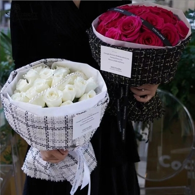Un bon prix. Tissu d'emballage de bouquet de fleurs de style Xiang, merveille d'emballage de cadeaux de fleurs, tissu de luxe léger haut de gamme, matériel de fleurs en gros en ligne