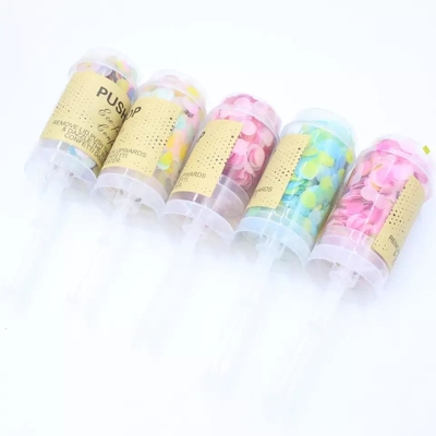 Un bon prix. Les feux d'artifice tenus dans la main en gros de confettis font la fête des boutons-pression poussent le canon de confettis de boutons-pression de bruit pour le mariage de confettis d'enterrement de vie de jeune garçon en ligne