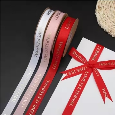 Un bon prix. Lettres en polyester classique fil d'amour éternel ruban à rouleaux pour bouquet et emballage de cadeaux en ligne