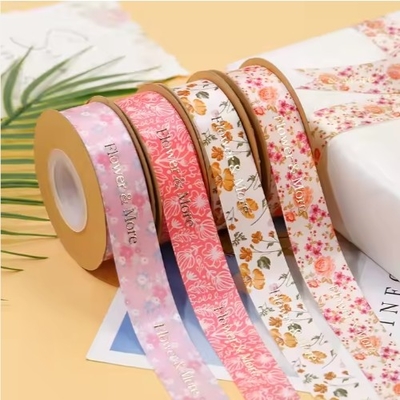 Un bon prix. Ruban d'emballage cadeau en polyester imprimé sur mesure Ruban satiné pour bouquet écologique en ligne