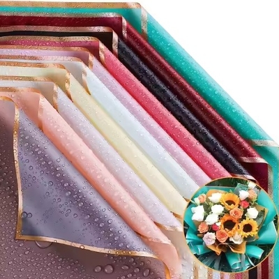 Bon prix Papier d'emballage de fleuriste coloré imperméable à l'eau 58*58cm en ligne