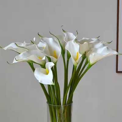 Un bon prix. Des fleurs artificielles en EVA de haute qualité, à la touche, pour les mariages, pour les fêtes. en ligne