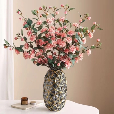 Un bon prix. Camilia fleurs artificielles, arrangement de fleurs de camélias à plusieurs têtes, branches longues, fleurs artificielles, décoration intérieure en ligne