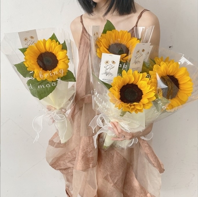 Un bon prix. Teachers' Day English transparent opp plastic waterproof cellophane flower packaging material Sunflower bouquet wrapping paper en ligne