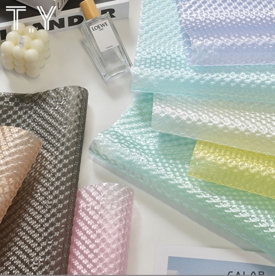 Un bon prix. Nouveau papier à bulles en verre pour le festival de Qixi, papier d'emballage pour les bouquets de fleurs, imperméable, texturé en trois dimensions, papier en relief de haute qualité en ligne