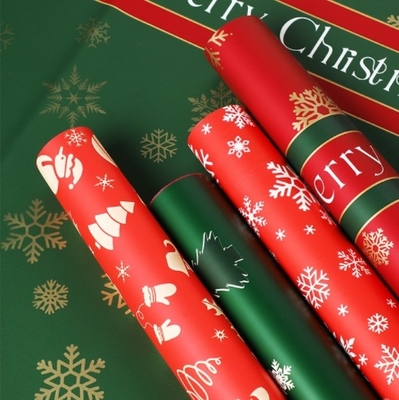 Un bon prix. Papier d'emballage de fleurs de Noël, papier d'emballage de bouquet de pommes la veille de Noël, cellophane étanche à flocons de neige, cadeaux en papier Ouya en ligne