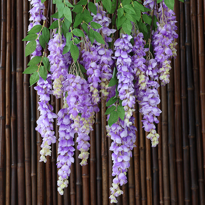 Un bon prix. Simulation de fleurs géantes de lustres avec de longues branches, fleurs en plastique, fleurs en soie, salon intérieur, bandes de rotin suspendues, décoration photographique en ligne