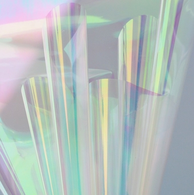 Un bon prix. Film couleur fantôme, cellophane laser, film arc-en-ciel, papier d'emballage cadeau bouquet de fleurs, magasin de fleurs de nouveaux matériaux en ligne
