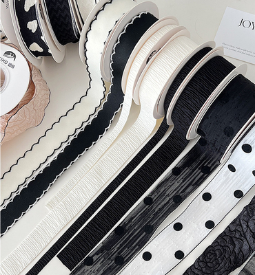 Un bon prix. Polyester série noir et blanc ruban bouquet de fleurs bandeau pour les accessoires de cheveux bricolage artisanal arc en ligne