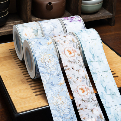 Des gâteaux cuits à l'encre de style chinois avec ruban d'emballage cadeau écologique Bouquets de fleurs et ruban d'extinction