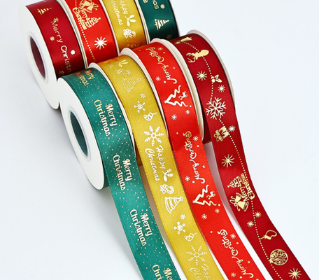 Un bon prix. Rubans de Noël pour cadeaux de décoration de vacances avec estampage à chaud, rubans en polyester pour emballage de boîtes cadeaux, transfrontaliers 2,5 cm/25 m en ligne