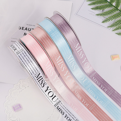 Un bon prix. le ruban de emballage de satin du gâteau 25mmx50y a imprimé le ruban de Mlle You Gift Wrap en ligne