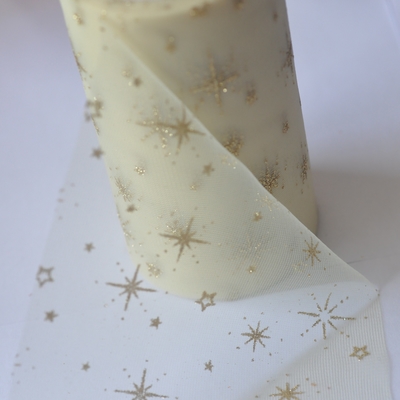 Un bon prix. Tissu en rouleau d'organza multicolore avec motif étincelant en ligne