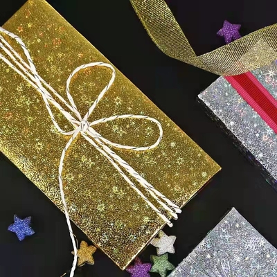 Un bon prix. Feuille en plastique 72cmx52cm de scintillement d'or de cadeau d'enveloppe de petit pain scintillant argenté de papier en ligne